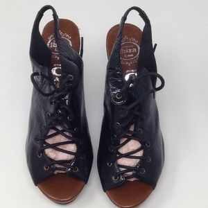 Jeffery Campbell patent leather sandal heels.